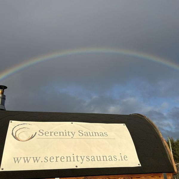 Rainbow over the Serenity Saunas sign